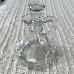 Vintage clear  glass oil vinegar cruet. 5” tall. 3.5” wide. 47 base 39 stopper.